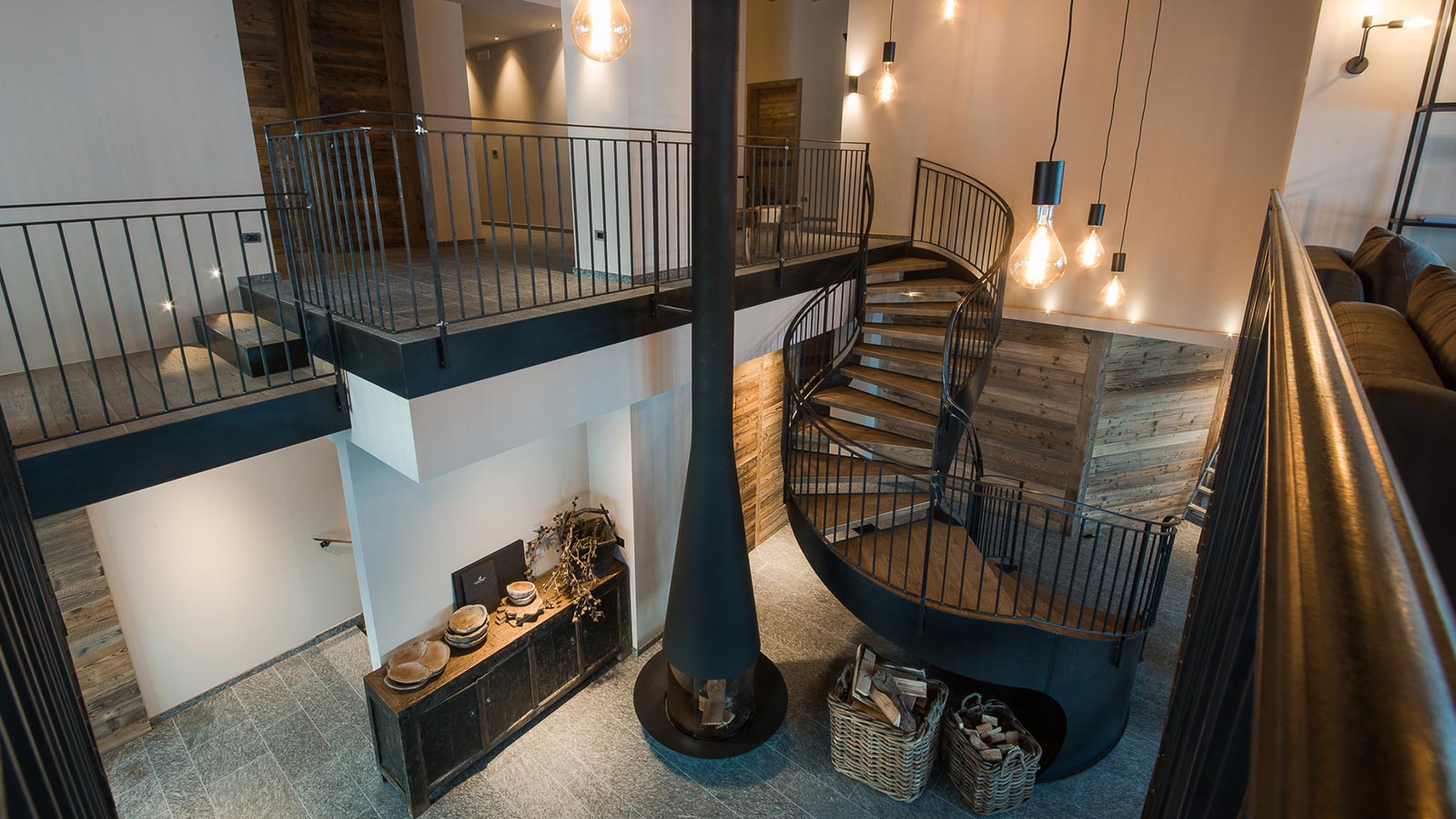 Spiral staircases inside deluxe mountain chalet